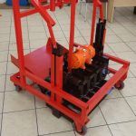 Electric Egg-Layer Paving Brick Making Machine, Red and brown with wheels